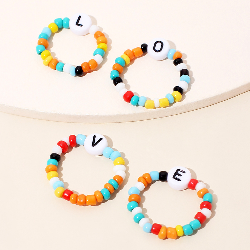 Hot Sale New Simple Color Rice Beads Love Ring Letter 4 Sets Of Ring Wholesale Nihaojewelry display picture 3