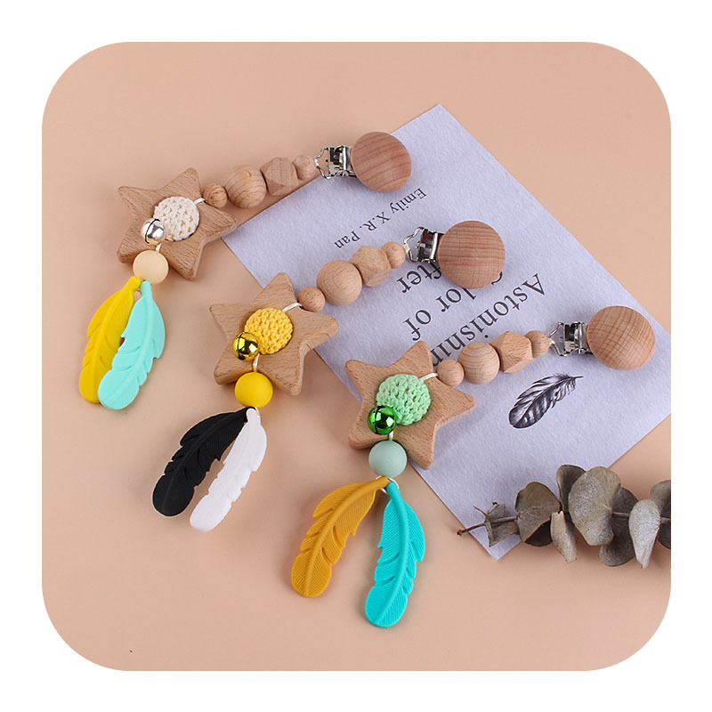 DIY pluma de silicona estrella de cinco puntas juguete teether cochecito coche colgando accesorios bebé chupete cadena teether palo