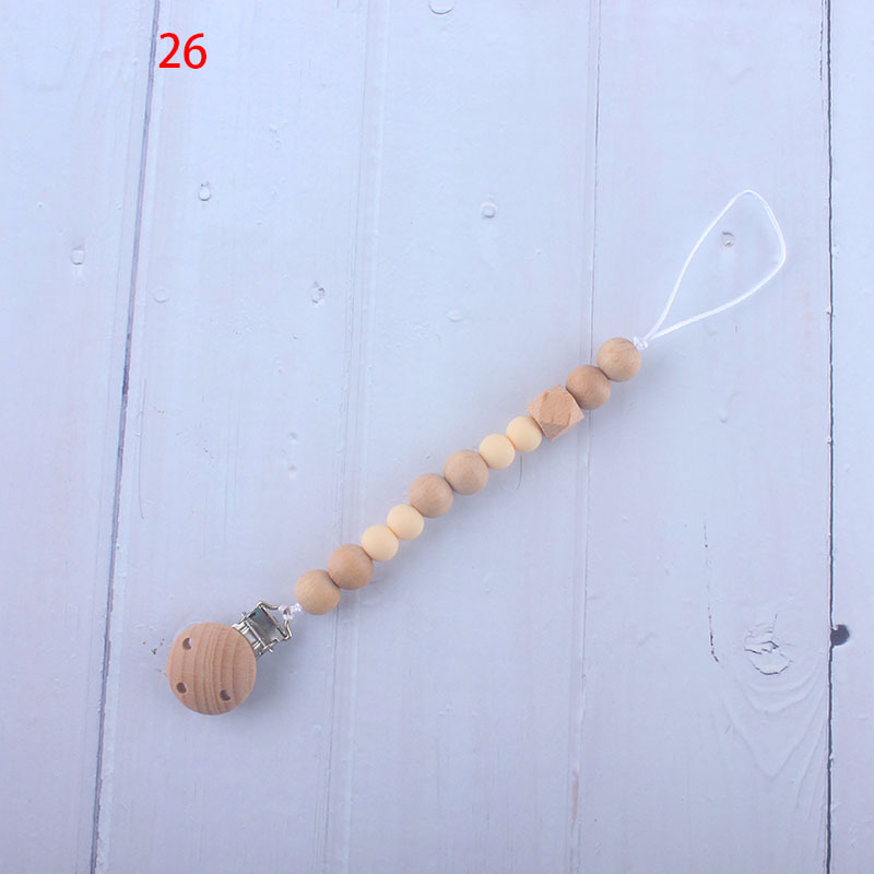 Nueva fábrica directa bebé Beech juguete mordedor bebé chupete de silicona pezón anti-gota cadena materna y infantil suministros