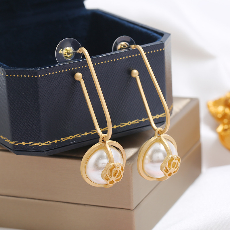 Korea New Creative Simple  Fashion Trend Long Flower Pearl Earrings Wholesale Nihaojewely display picture 7