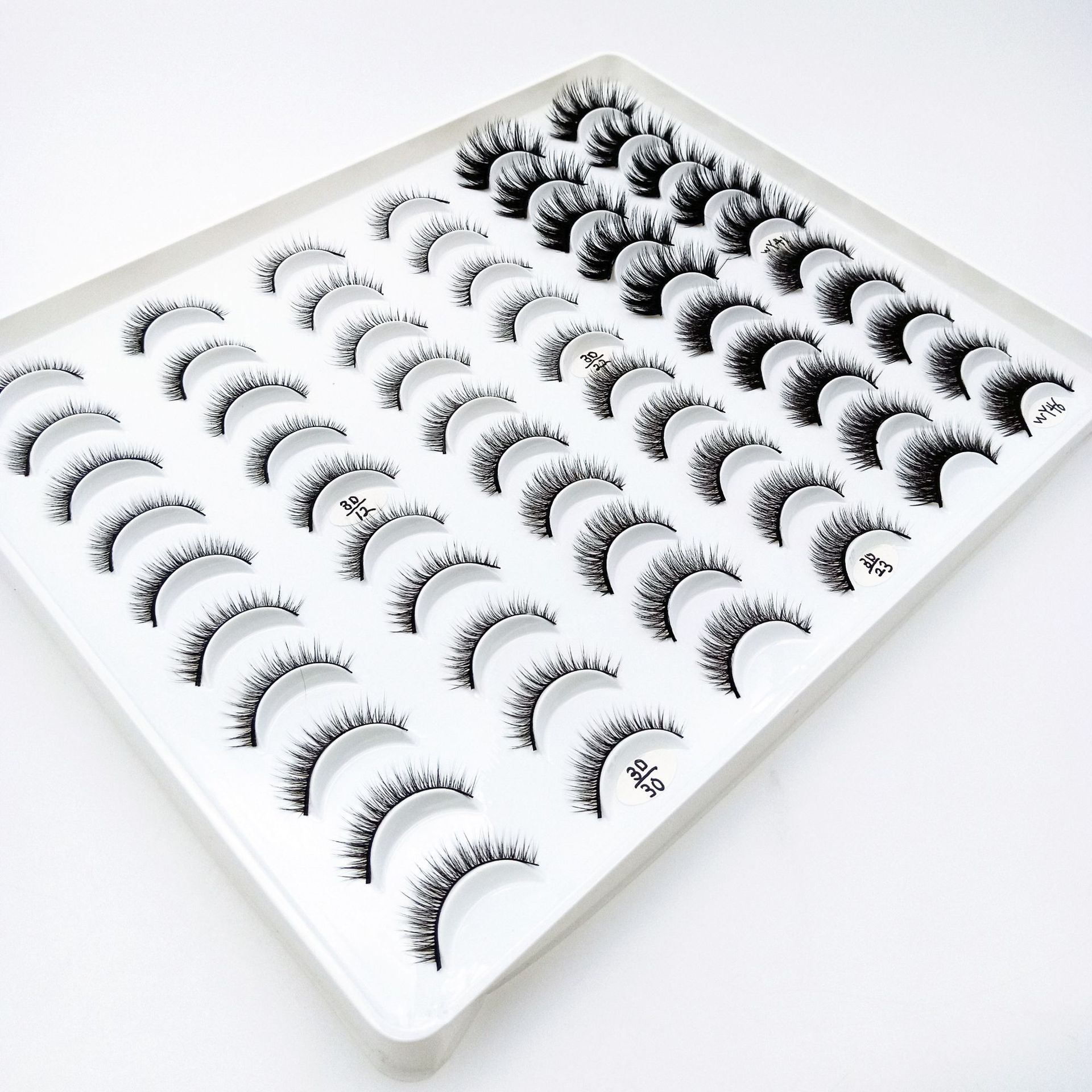 Venta al por mayor de fábrica tridimensional Cruz multi-capa de pestañas ojos grandes europeos y americanos 30 pares mezclados rizado pestañas postizas