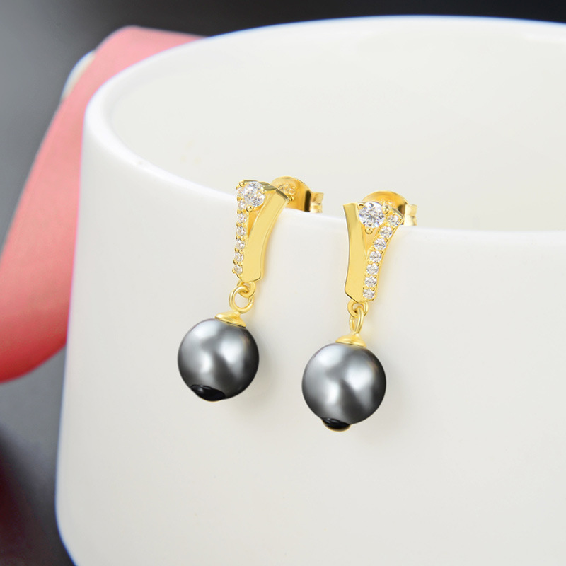 Super Hada moda noble pendientes femeninos transfronterizos productos calientes venta al por mayor Pendientes de plata s925 con incrustaciones de perlas chapado en oro temperamento elegante