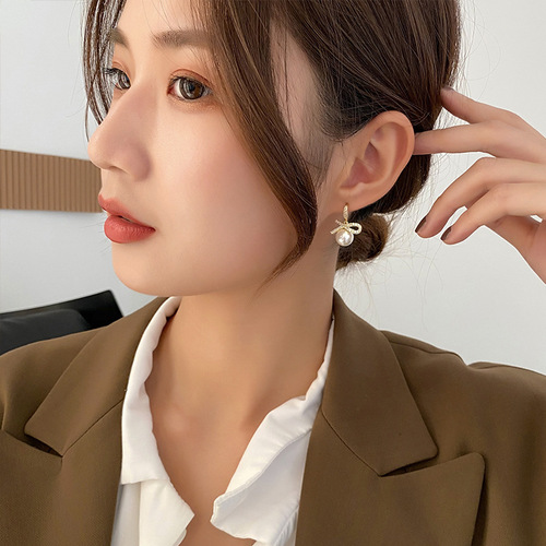 Korean new ear hook short symmetrical bow pearl earrings personality simple temperament small internet celebrity earrings for women