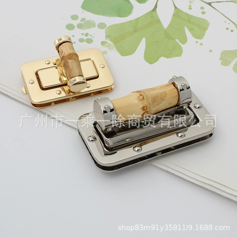 Factory direct sale natural bamboo knot clasp golden twist lock handmade bamboo double G bag bamboo turning lock, package fixed lock