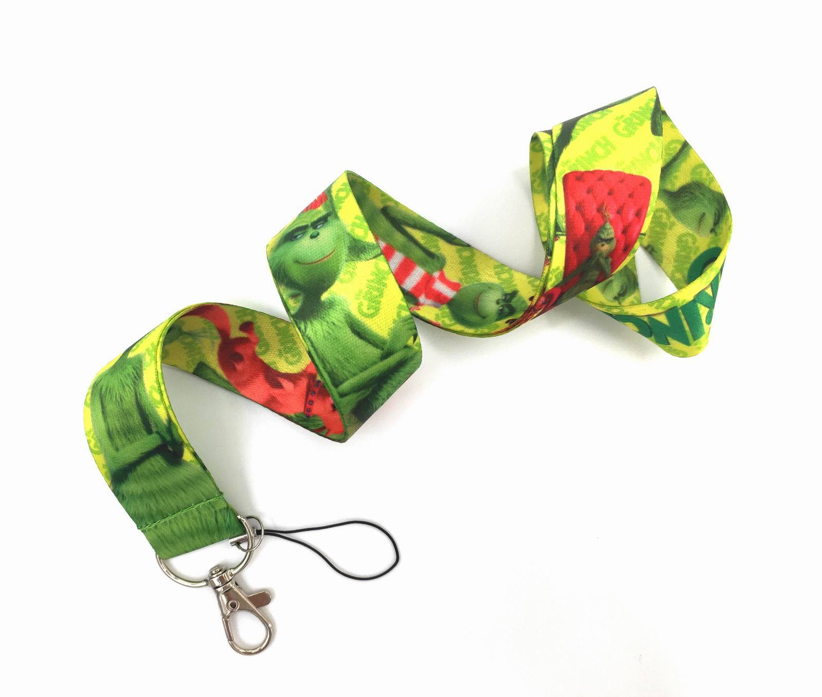 Venta caliente Navidad monstruo Grinch dibujos animados de dibujos animados cubierta de tarjeta de fábrica certificado insignia Halter cordón suministro de comercio exterior