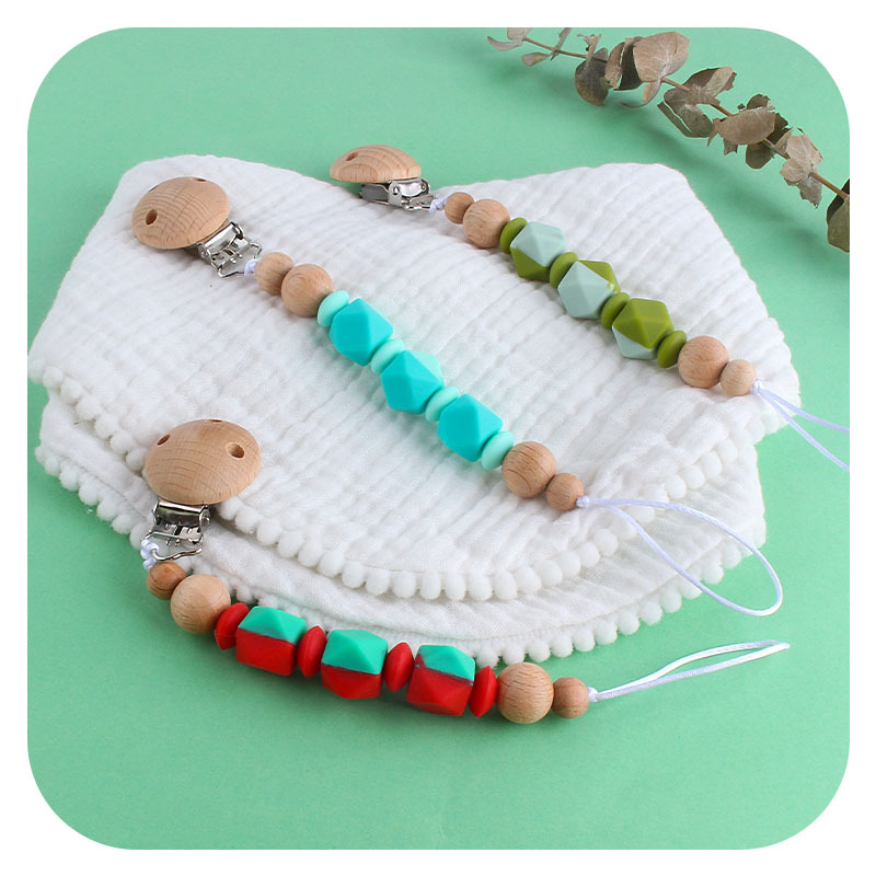 Suministros para bebés nuevo clip de chupete de haya DIY creativo de dos colores de silicona octogonal cuentas de juguete mordedor chupete cadena