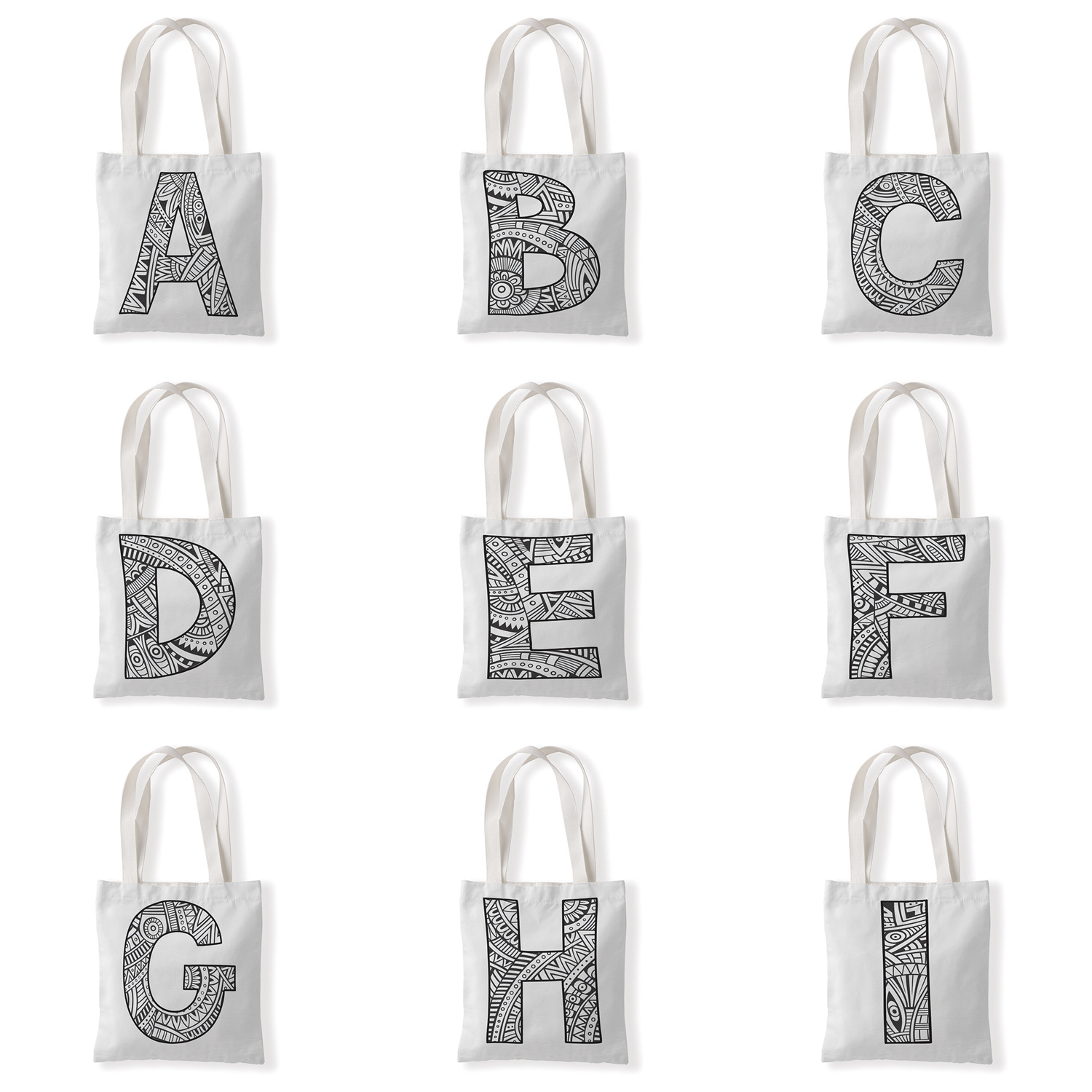 创意几何字母图案帆布材质袋单肩学生小手拎包零钱袋休闲百搭女包