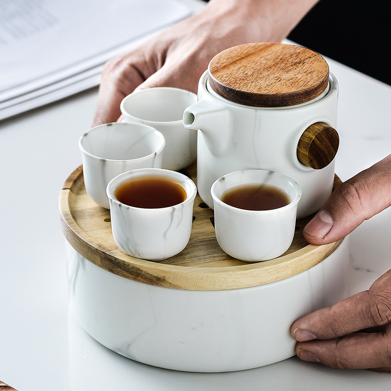 Marbling creativo juego de té de Kung Fu japonés simple juego de té de viaje logotipo personalizado una olla cuatro tazas juego de té traje