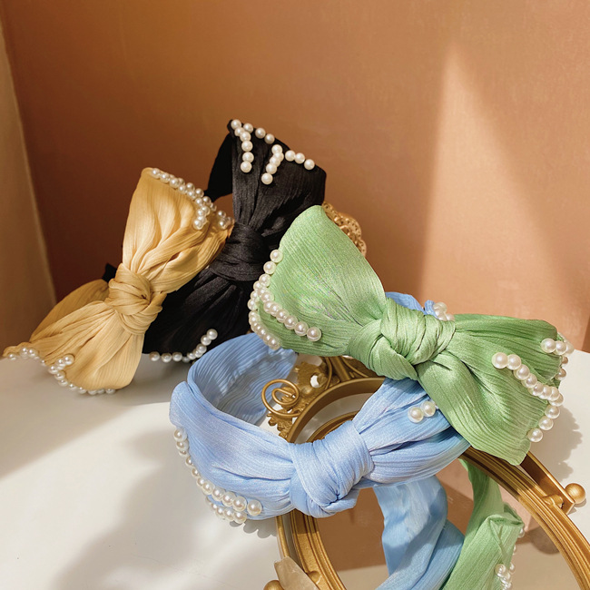 Korea's Pearl Bowknot Wide-brimmed Hairband Folds New Fashion Color Cloth Headband Hair Bundle Wholesale Nihaojewelry display picture 7