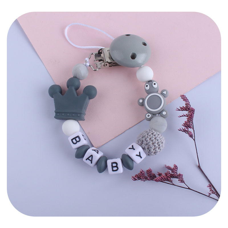 Bebé de plástico carta chupete clip bebé calmante corona de silicona tortuga mordedor chupete cadena anti-gota cadena