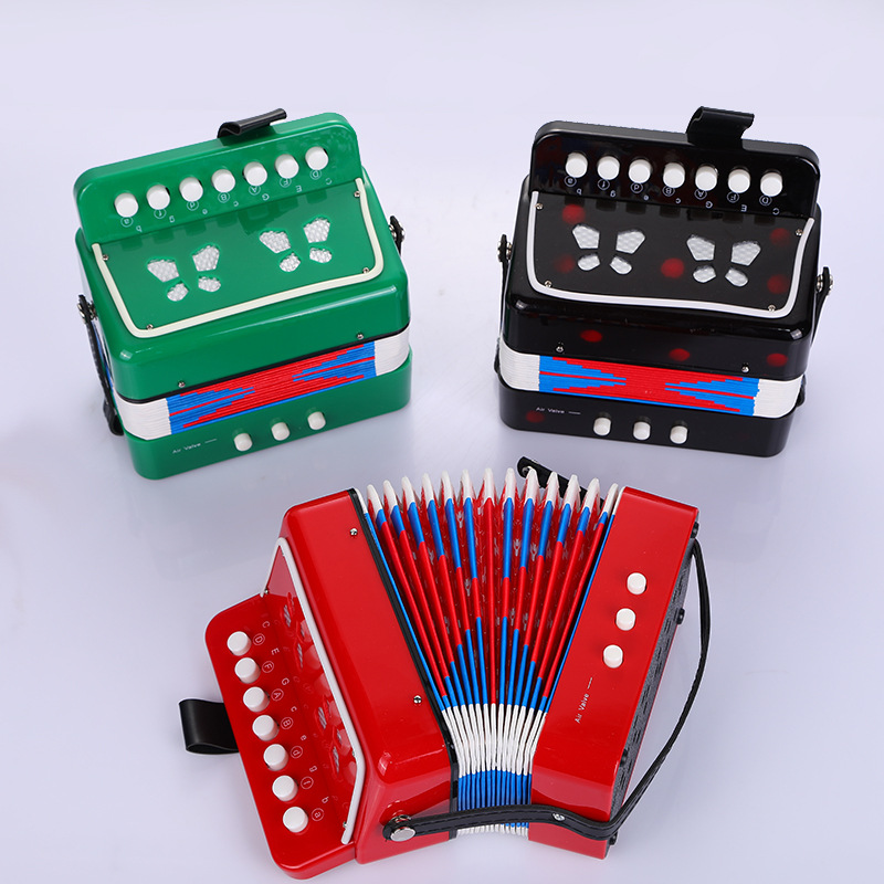 Acordeón infantil de 7 teclas para principiantes, instrumento musical occidental para la educación temprana, juguete musical multicolor en caja.