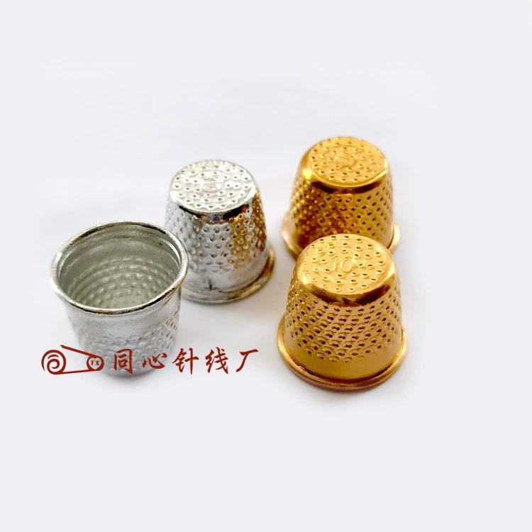 Подлинная бытовая серповидная подкладка? Пояснение: исходная фраза: "Genuine household thimble, ring pinholes, fingertip thimble thimble thimble with hat with hat, top mouth gold tip needle"