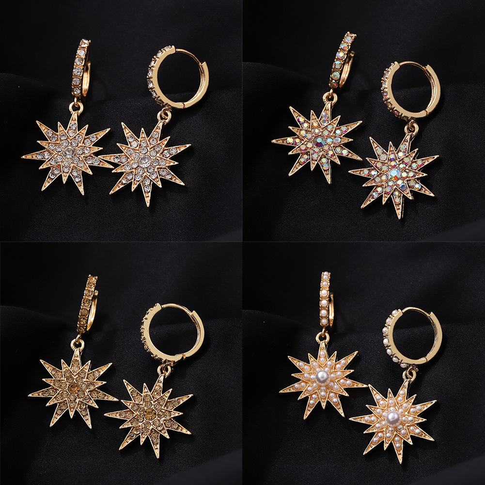 Fashion Six-pointed Star Tassel Inlaid Pearl Earrings display picture 10