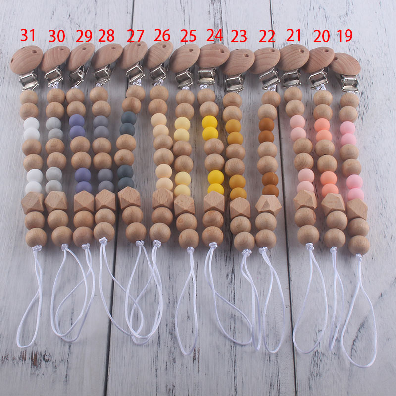 Nueva fábrica directa bebé Beech juguete mordedor bebé chupete de silicona pezón anti-gota cadena materna y infantil suministros