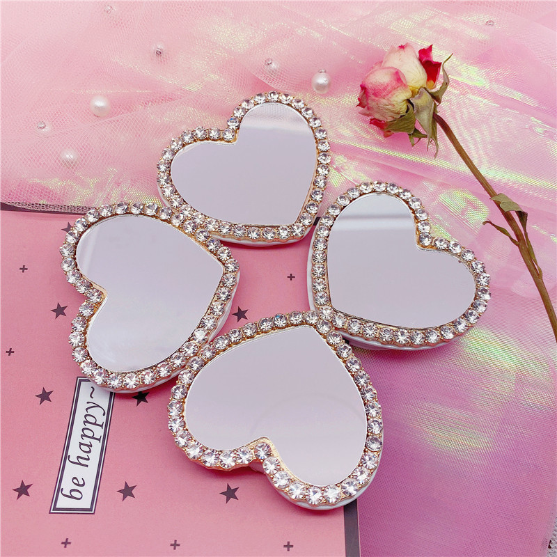 Diamond-encrusted Heart-shaped Mirror Airbag Telescopic Mobile Phone Bracket display picture 4