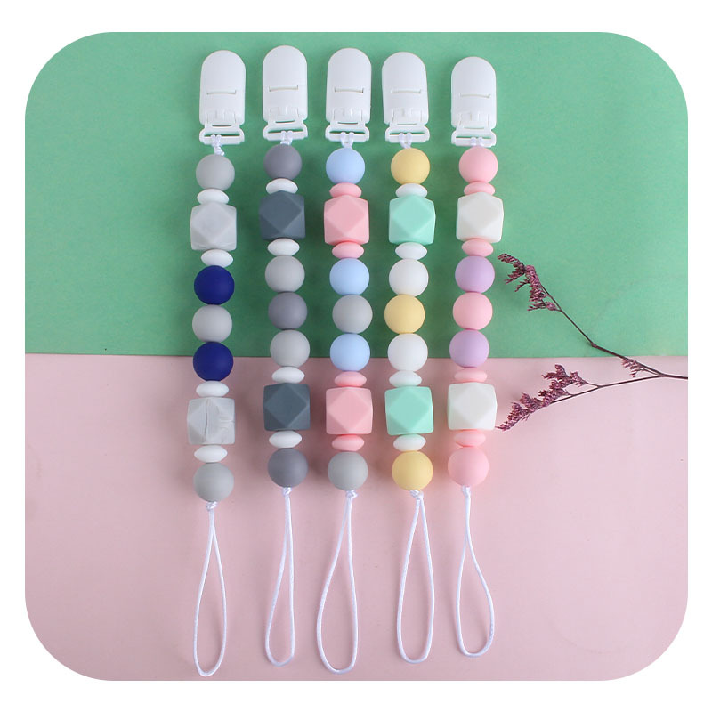 Bebé clip de chupete de plástico bebé calmante de silicona estrella de cinco puntas pulsera molar chupete cadena Amazon nuevo