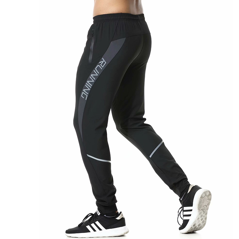 2022 verano nueva moda deportes pantalones sueltos de los hombres pantalones transpirables delgados casuales al aire libre pantalones elásticos al por mayor