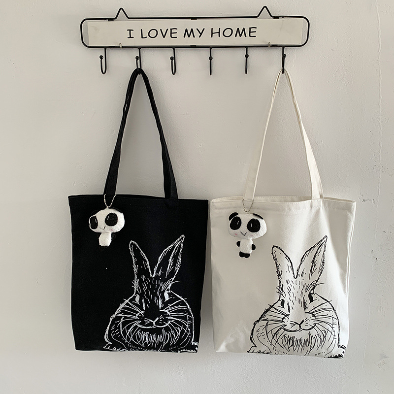 Bolsa de lona femenina estudiante de un solo hombro japonés ins bolsa de tela impresa de dibujos animados lindo de gran capacidad