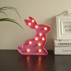A DIY digital LED holiday decoration light toy shaped like a little rabbit, night light for holiday parties
