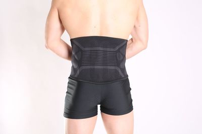 厂家直销新款腰部固定透气支撑带男女通用腰间盘突出加压横机护腰