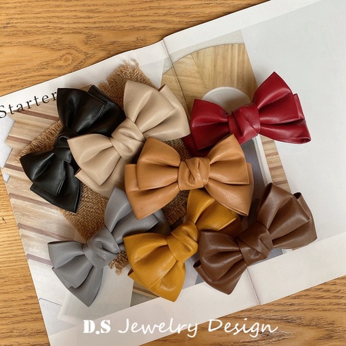 South Korea's Dongdaemun temperament retro spring and summer new PU leather bow hairpin Internet celebrity pressure clip bangs clip hair accessories