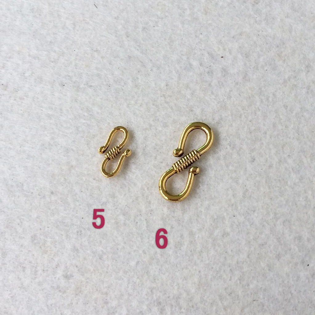 Golden S buckle.jpg