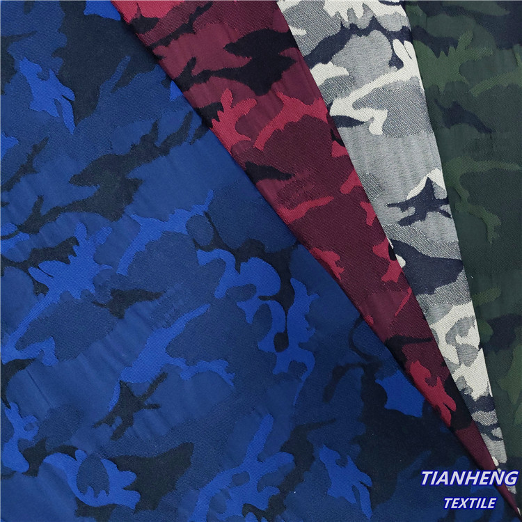 涤棉混纺罗缎迷彩提花 时尚男女装裤装西装外套箱包面料现货批发