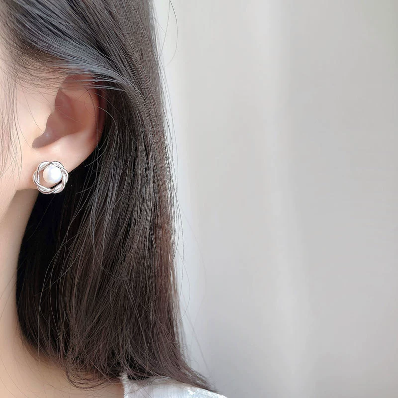 Sophisticated small earrings from pearl, silver 925 sample