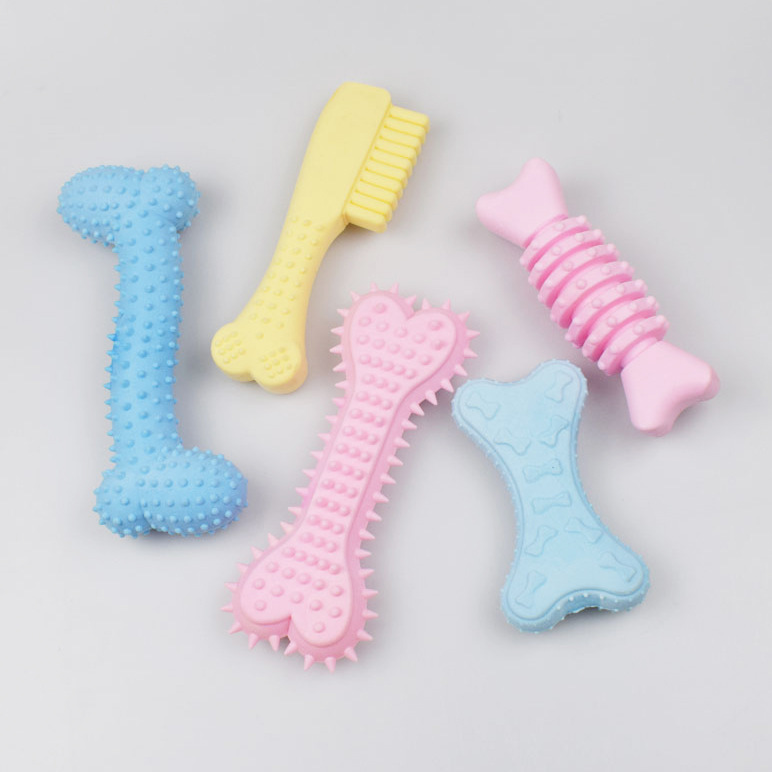 Nuevo color perro molar Limpieza de dientes juguete TPR leche sabor espuma hueso mascota Bola de juguete fábrica al por mayor