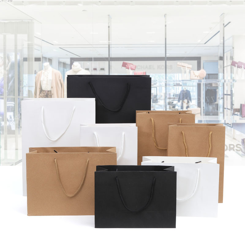 现货手提纸袋定 制白卡纸服装礼品购物袋牛皮纸手提袋定 做印logo