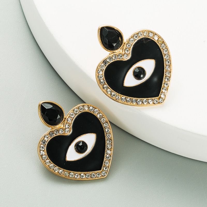 Fashion Eye Diamond Alloy Artificial Gemstones Earrings display picture 3