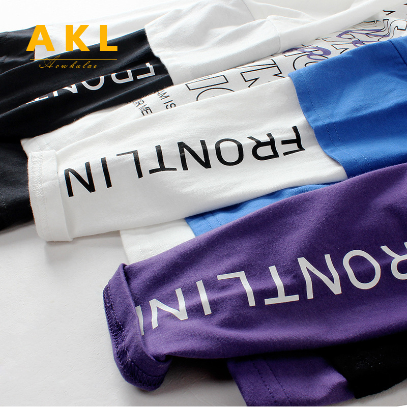 Primavera y otoño estilo coreano ropa para niños nueva camiseta de manga larga para niños medio y grande color de algodón para niños a juego camisa de fondo para niños de dos piezas falsas