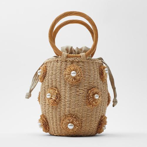 Manufacturer source artificial pearl decoration new straw woven bag trendy women's bag flower hand basket bag woven bag