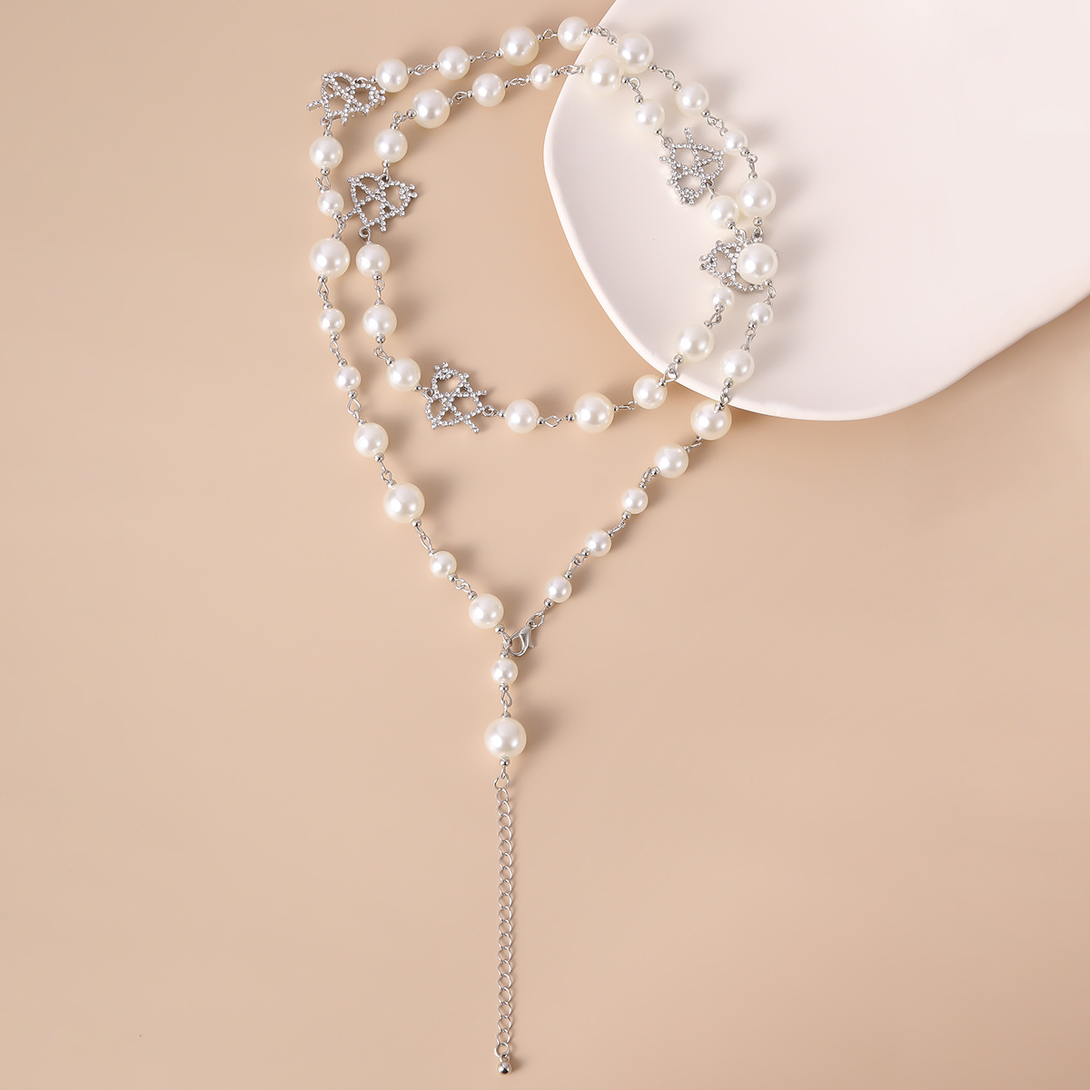 Fashion Simple Multi-layer Pearl Necklace Hollow Micro Diamond Heart-shaped Necklace display picture 5