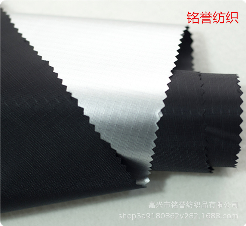 四分格牛津布210D黑色水压2000涂银，帐篷布料车衣车罩厂家直销。