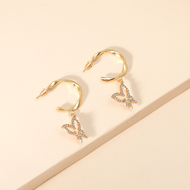 Korea Fashion Sweet Lady Hollow Butterfly Simple Age-reducing Geometric Twist C-shaped Alloy Earrings display picture 3