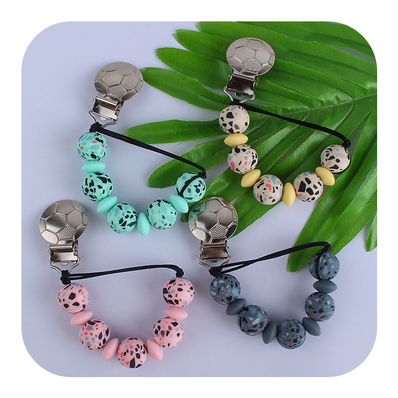 Nuevo bebé hierro fútbol chupete clip bebé creativo calmante leopardo impresión silicona cuentas mordedor chupete cadena anti-gota cadena