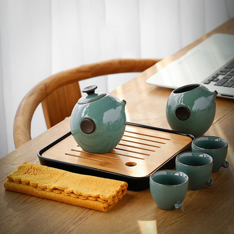 Horno Ding hecho a mano una olla cuatro tazas juego de té caja de regalo viaje azul bolsa portátil simple Kung Fu juego de té traje