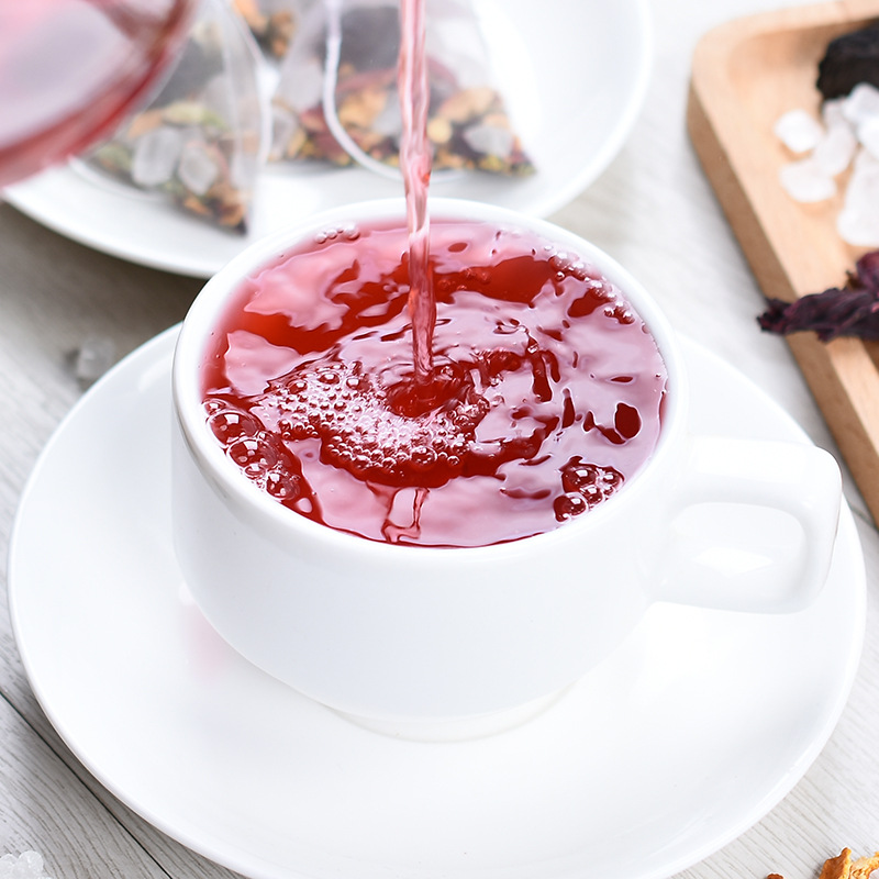 Old Beijing Suan Mei Tang Sour Plum Drink Tea Bags with Wumei Roselle Hawthorn Osmanthus 180g No-Brew Herbal Tea in use
