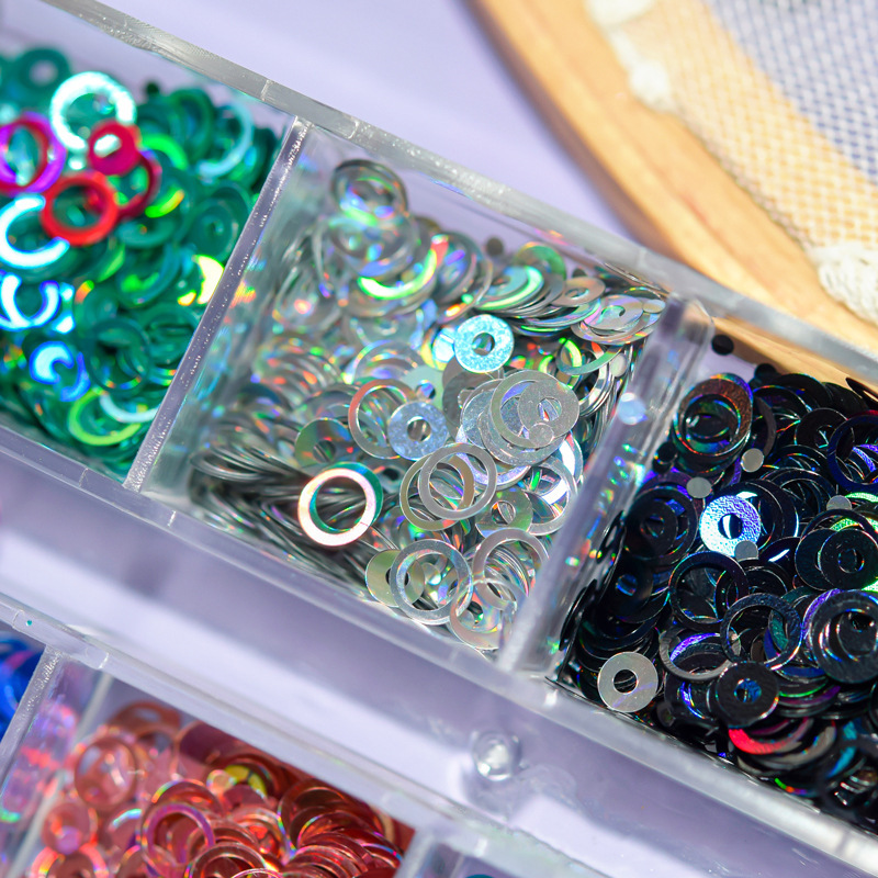 Suministro transfronterizo nuevas lentejuelas de uñas 12 colores huecos redondos lentejuelas joyería de uñas decoraciones de uñas al por mayor