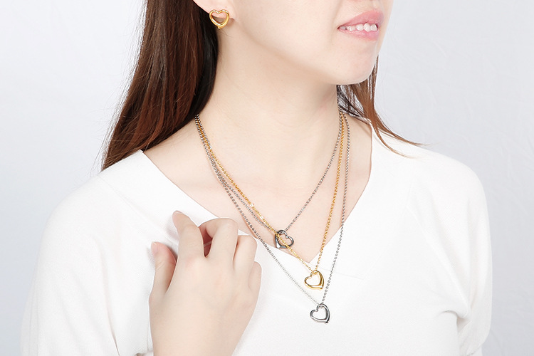 hollow heart-shaped three-layer necklace clavicle chain earrings set titanium steel set