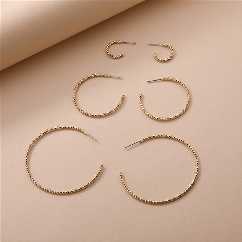 Wholesale Copper Peas Chain C-shaped Earrings display picture 1