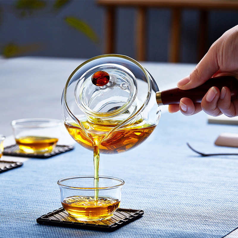 Fabricante de vidrio de borosilicato tetera pequeña verde naranja tetera eléctrica estufa de cerámica calefacción Kung Fu juego de té mango lateral tetera