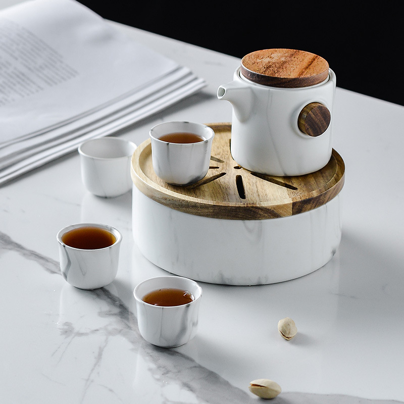 Marbling creativo juego de té de Kung Fu japonés simple juego de té de viaje logotipo personalizado una olla cuatro tazas juego de té traje