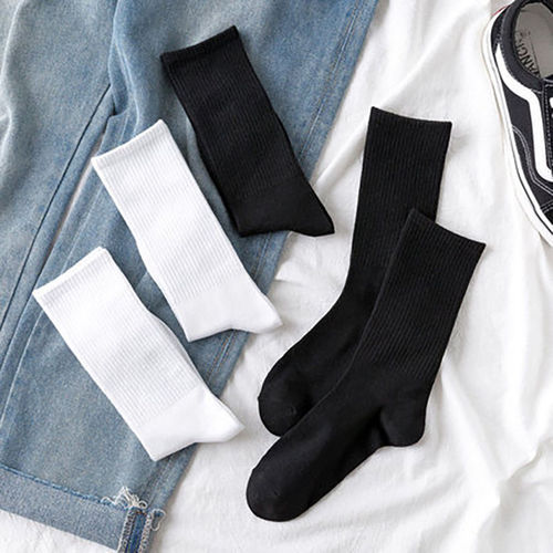 New solid color trendy socks for female couples European and American running sports socks ins socks for men mid-tube autumn and winter long tube