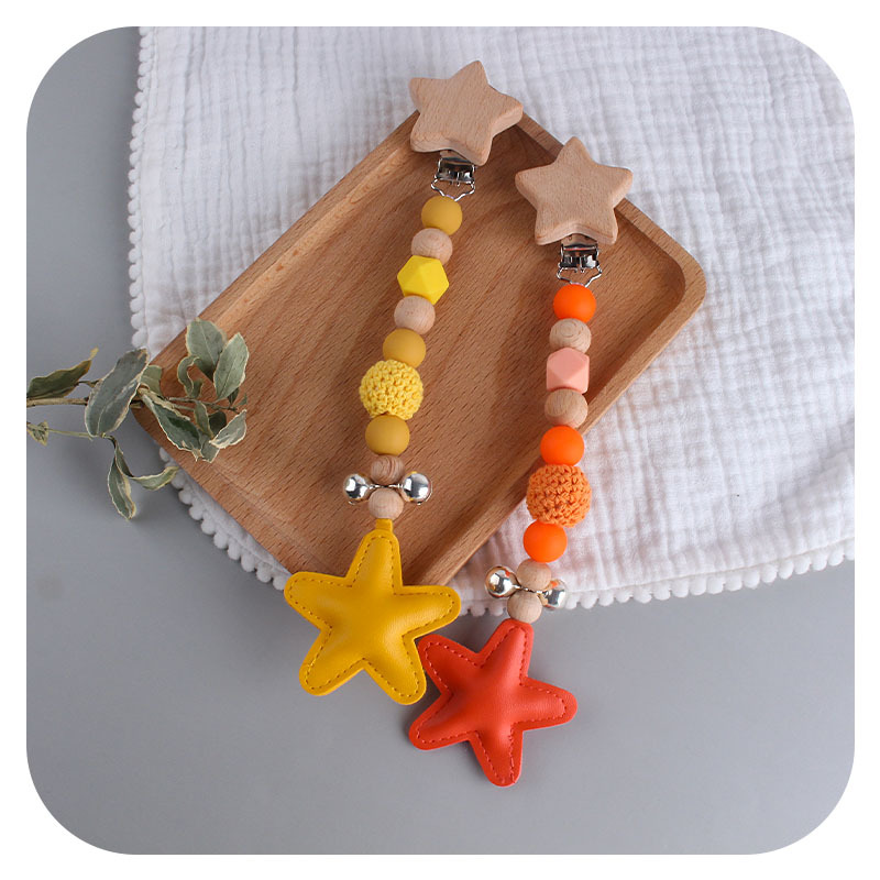 Nuevo Big Star Bell chupete cadena coche colgando joyería Bebé DIY creativo de haya de dibujos animados estrella de cinco puntas chupete clip