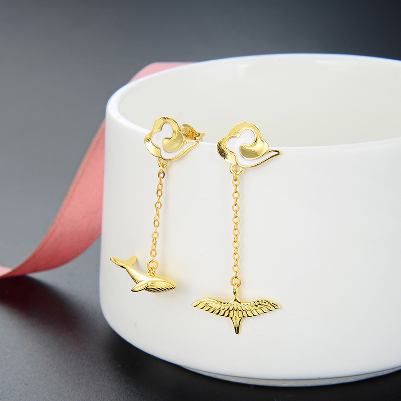 S925 gota de plata aceite ballena larga oreja pendientes estilo japonés y coreano creativo oro asimétrico pájaro pendientes