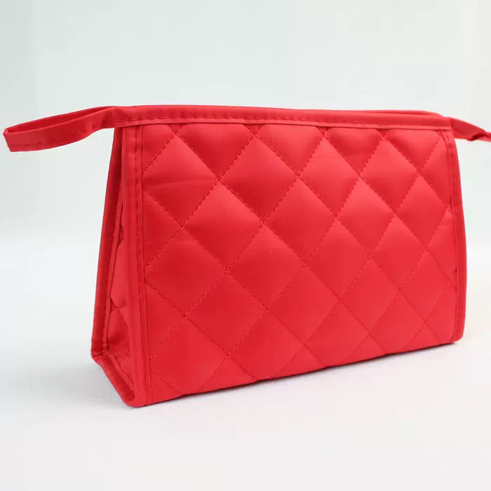 厂家直销上新简约女士化妆包布料纯色 手拿菱格丝绒袋广告促销定