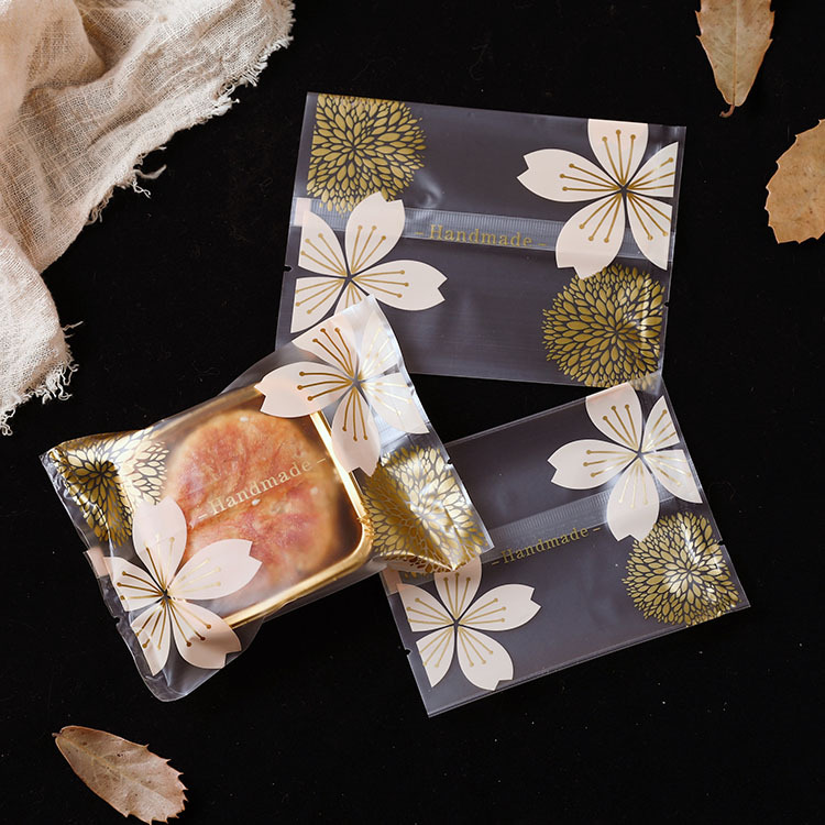 Directo de fábrica nueva corona flor de cerezo copo de nieve bolsa de embalaje crujiente bolsa de galletas de carne esmerilada máquina de sellado bolsa al por mayor