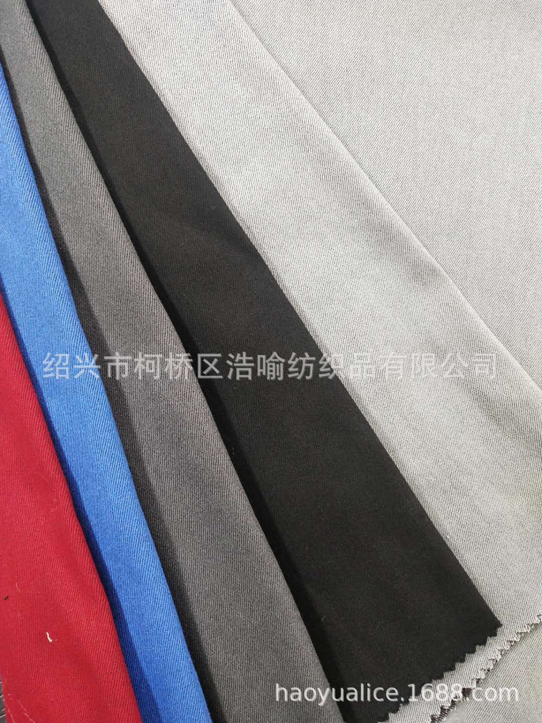 CVC弹力纱卡 棉涤弹力斜纹  时装裤装面料 仿牛仔面料